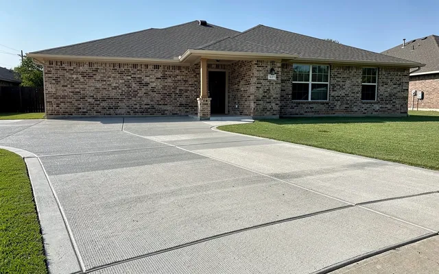 Concrete driveway pour in a Pearland, Texas neighborhood
